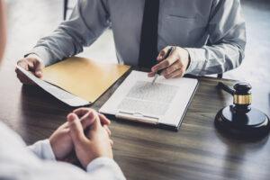 A personal injury attorney meets with a deceased individual’s family member and helps them understand what the average wrongful death settlement amount is.